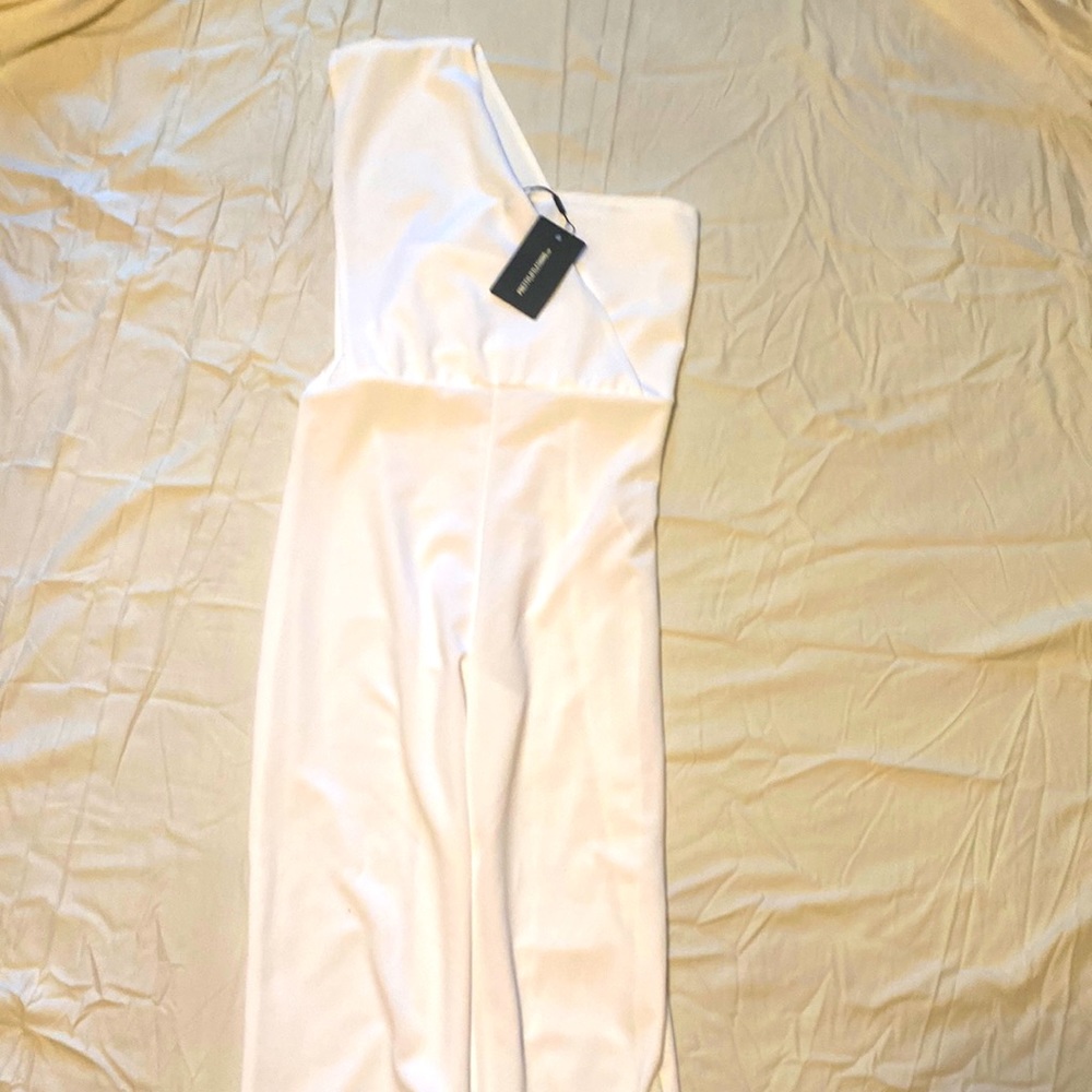 White one shoulder romper from Pretty Little Thing.